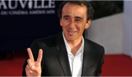 Elie Semoun V de victoire logo site officiel des journalistes