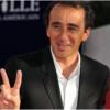 Elie Semoun V de victoire logo site officiel des journalistes